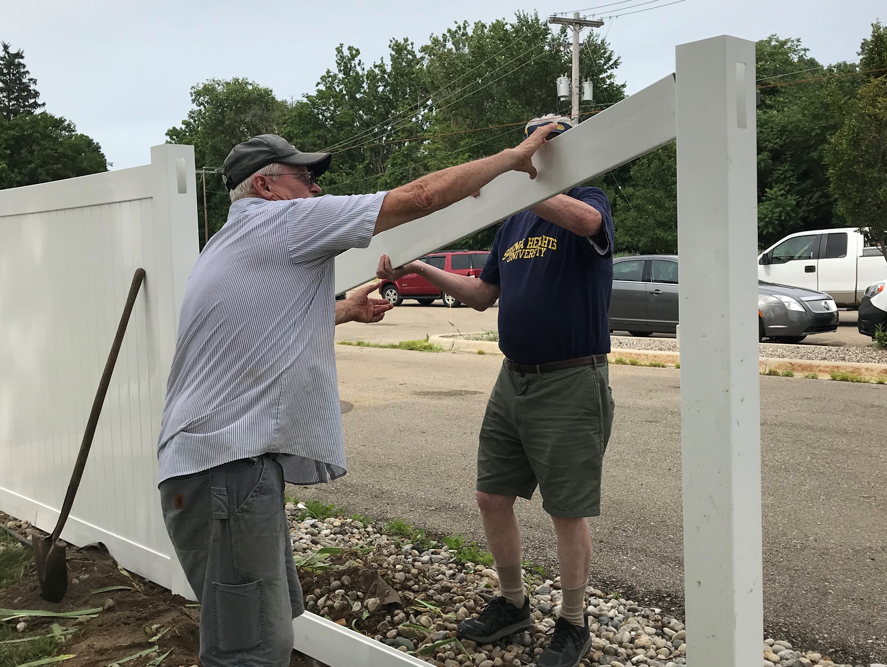 Volunteers build fence for Neighbors of Hope