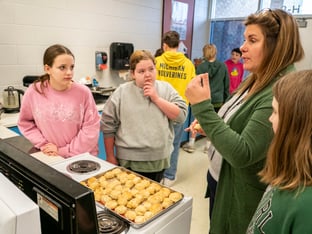 Katie Frederick teaches a group of students