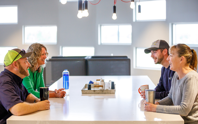 MEC employees in break room